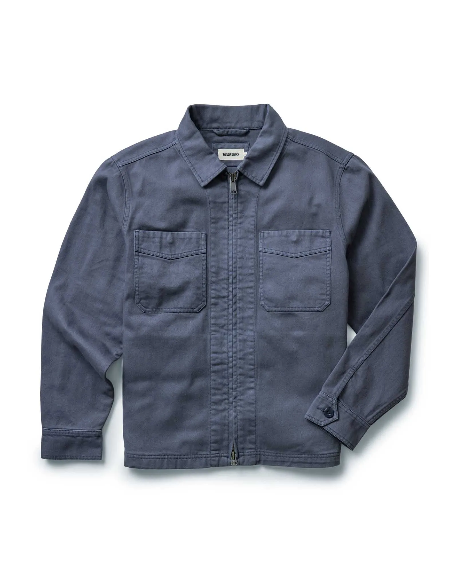 The Station Jacket in Petrol Blue Broken Twill sold by Taylor Stitch
