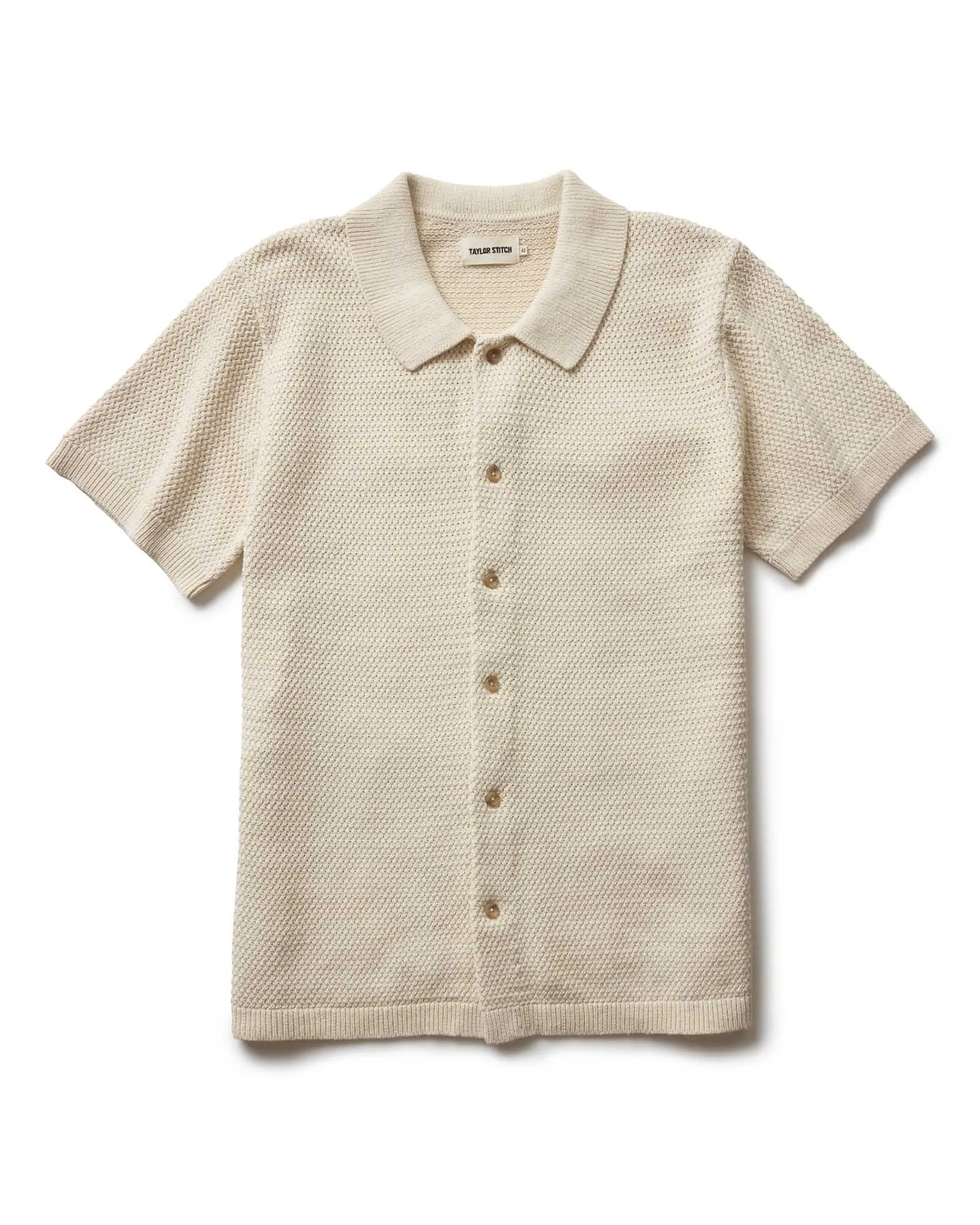The Button Down Polo in Heather Oat Crochet sold by Taylor Stitch
