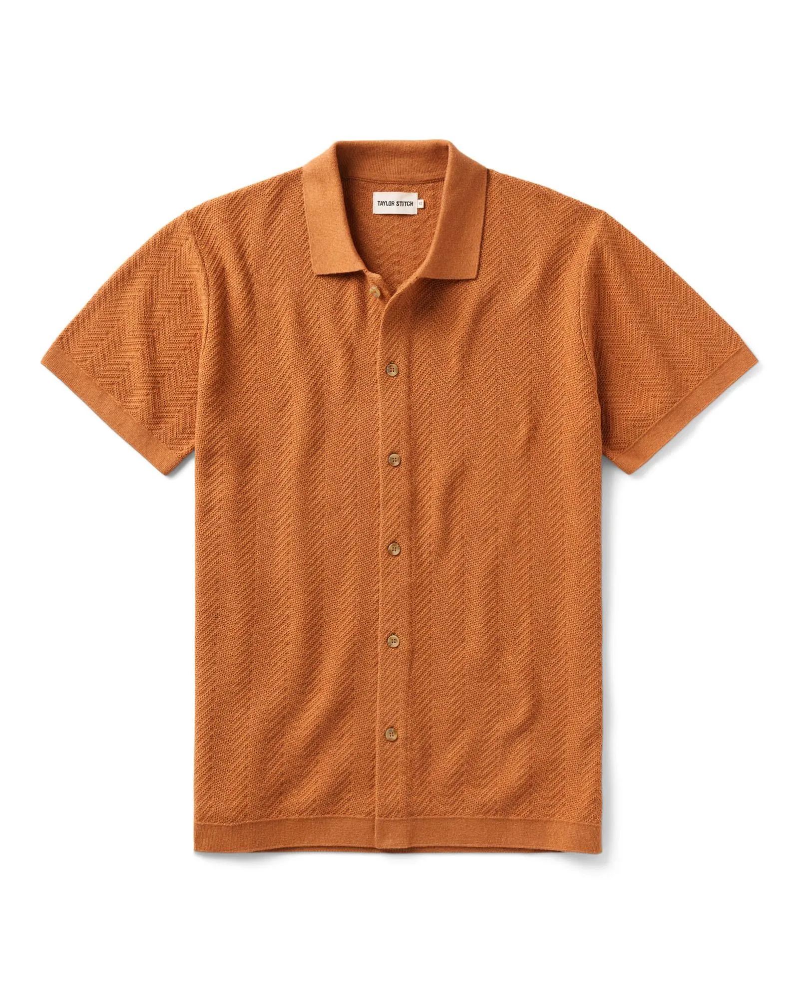 The Button Down Polo in Desert Herringbone sold by Taylor Stitch