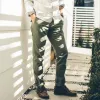 The Democratic Chino in Army sold by Taylor Stitch