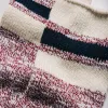 The Camp Sock in Heather Burgundy sold by Taylor Stitch