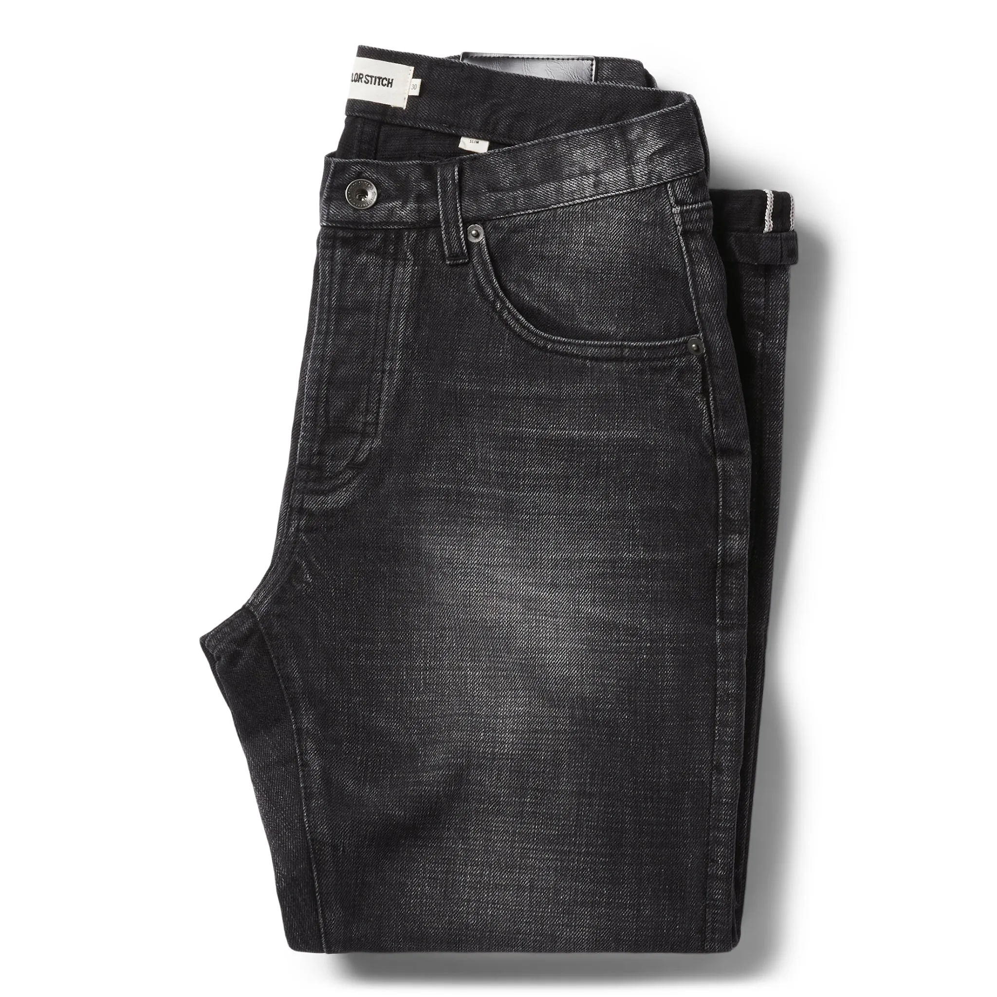The Slim Jean in Black 3-Month Wash Selvage sold by Taylor Stitch
