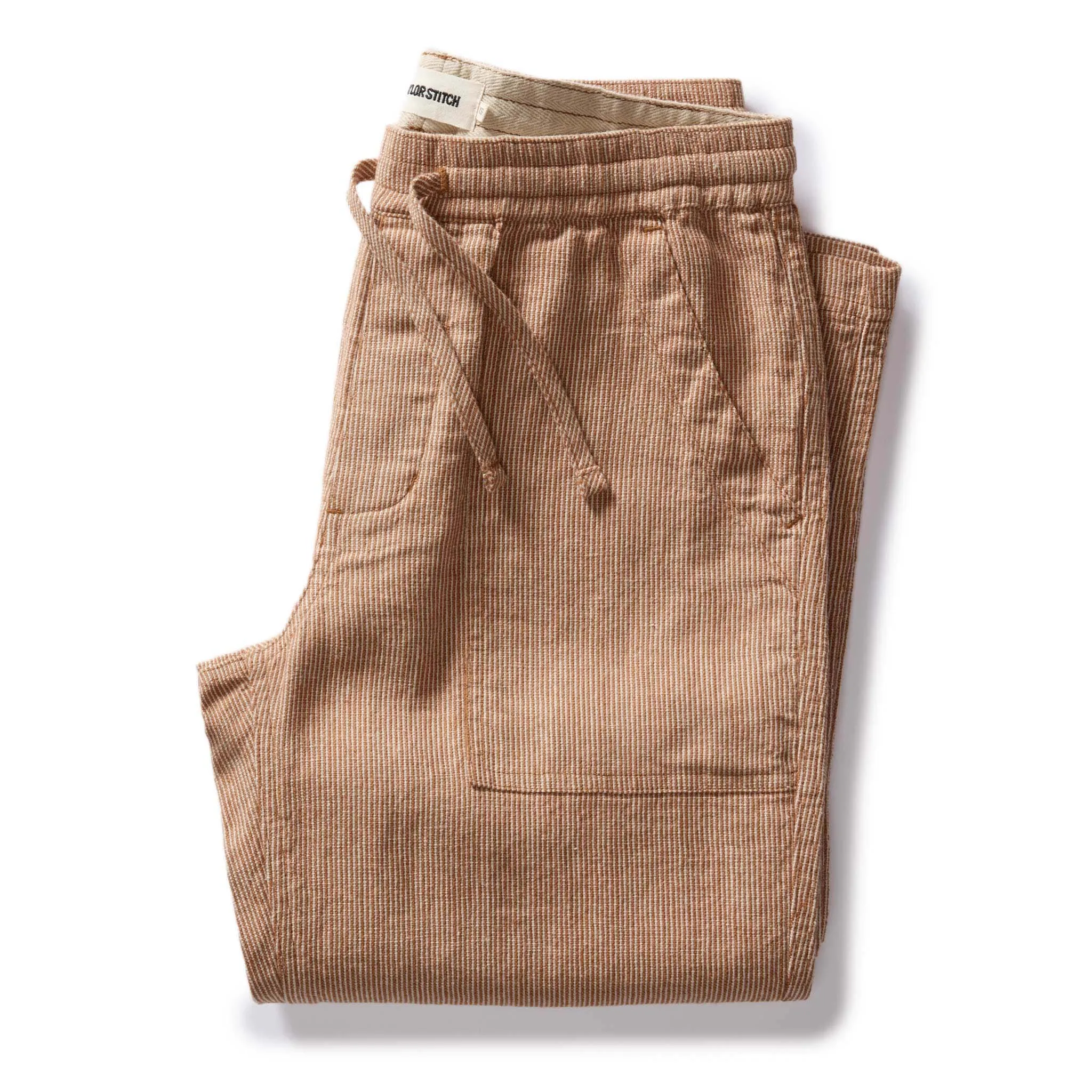 The Breakwater Pant in Chili Stripe Linen sold by Taylor Stitch