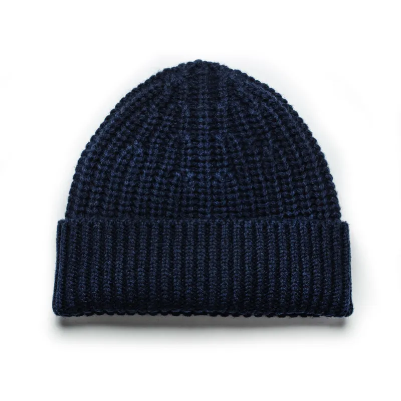 The Beanie in Navy sold by Taylor Stitch
