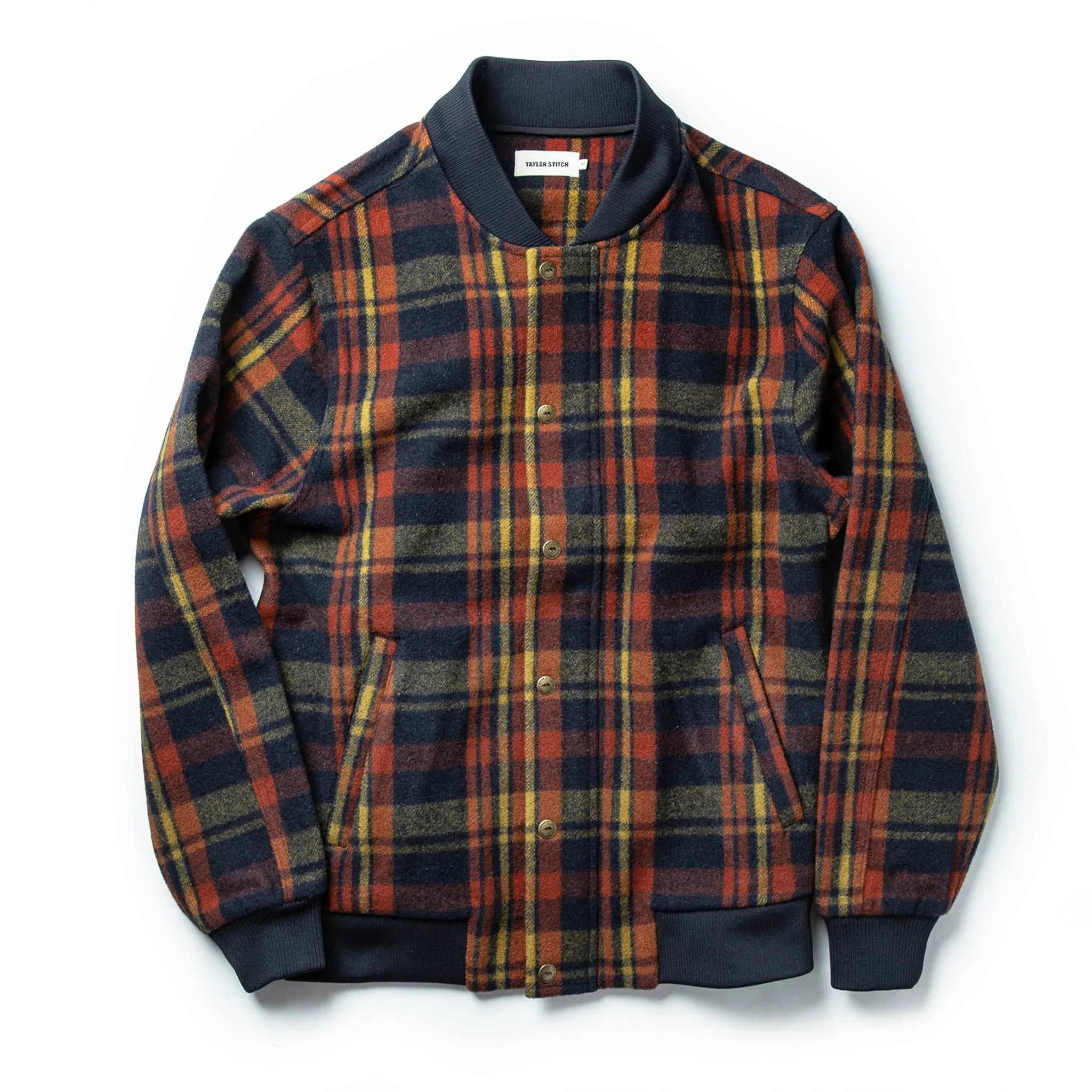 The Bomber Jacket in Navy Plaid Wool sold by Taylor Stitch