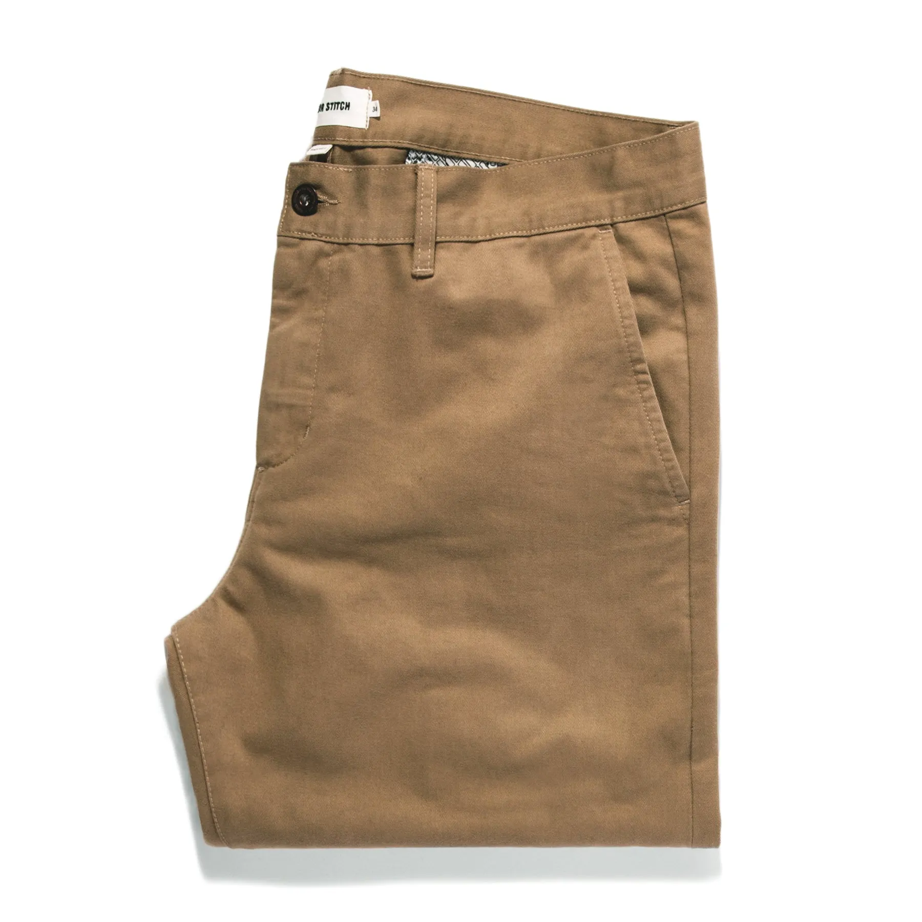 The Slim Chino in Khaki sold by Taylor Stitch