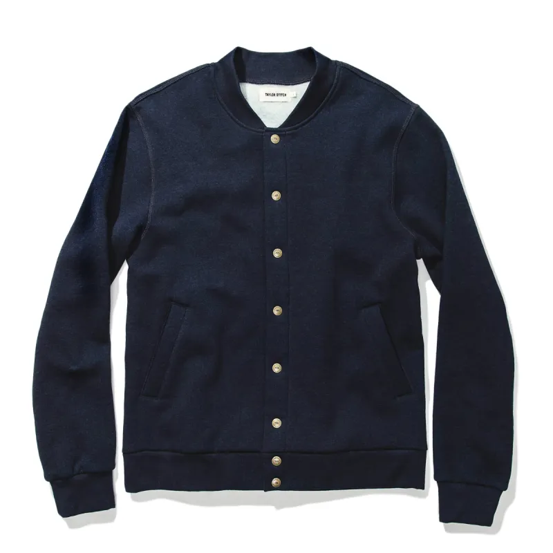 The Bomber in Indigo Fleece sold by Taylor Stitch