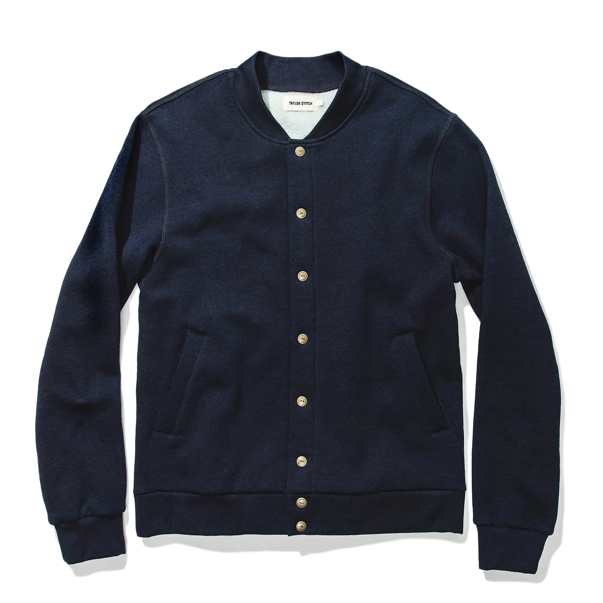The Bomber in Indigo Fleece sold by Taylor Stitch