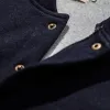 The Bomber in Indigo Fleece sold by Taylor Stitch