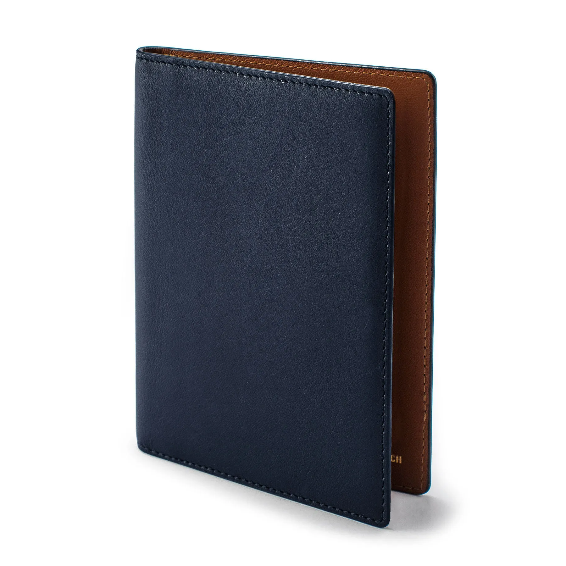 The Passport Wallet in Navy sold by Taylor Stitch