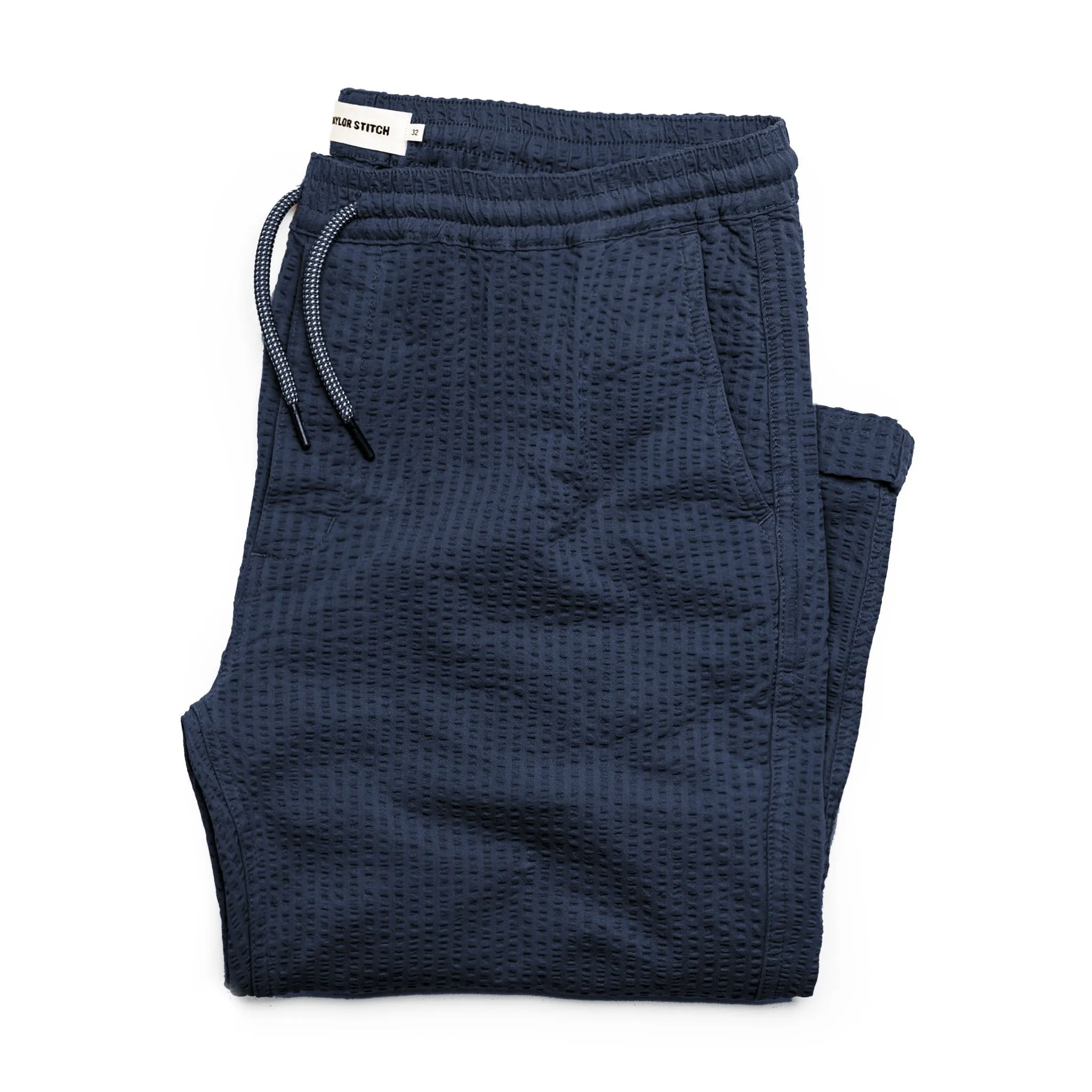 The Après Pant in Navy Seersucker sold by Taylor Stitch