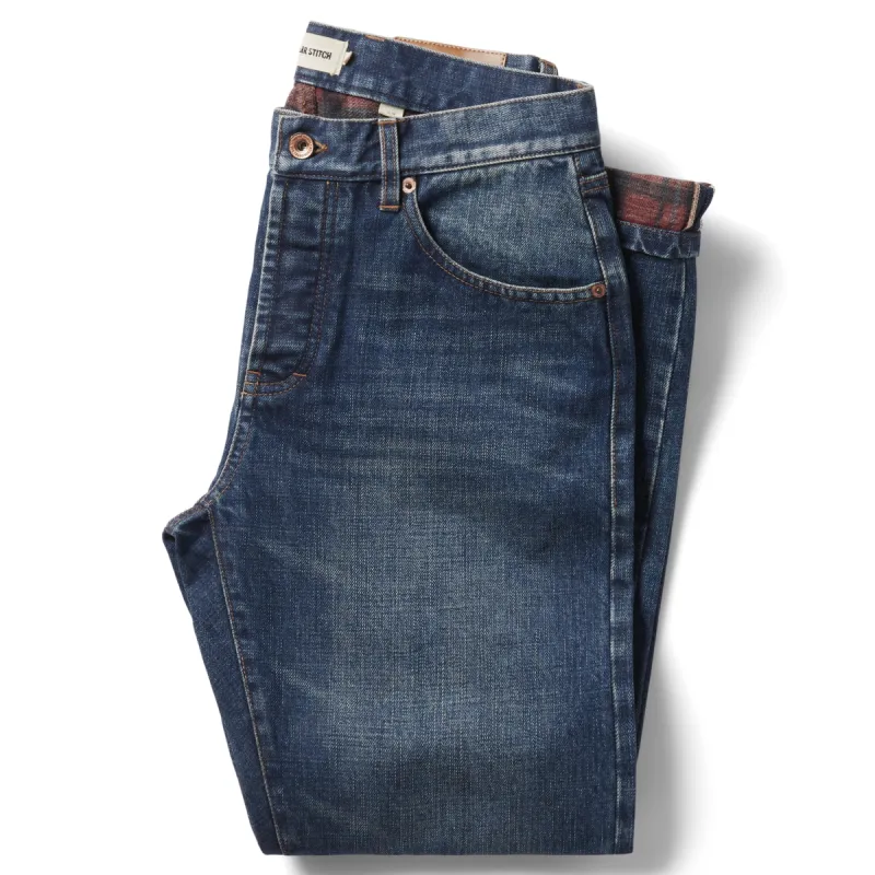 The Slim Brushed Back Jean in Sawyer Wash Organic Selvage sold by Taylor Stitch