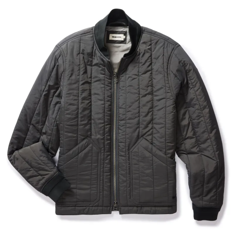 The Able Jacket in Faded Black Quilted Nylon made by Taylor Stitch