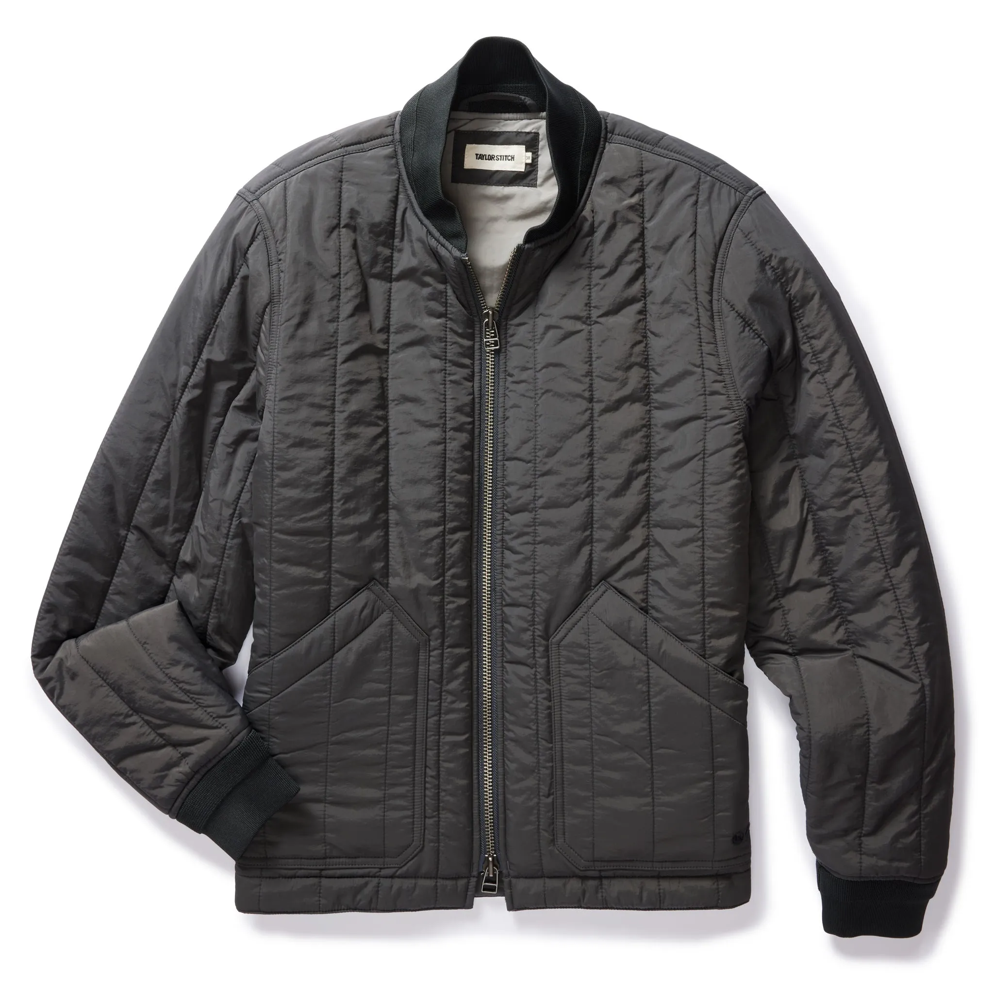 The Able Jacket in Faded Black Quilted Nylon sold by Taylor Stitch