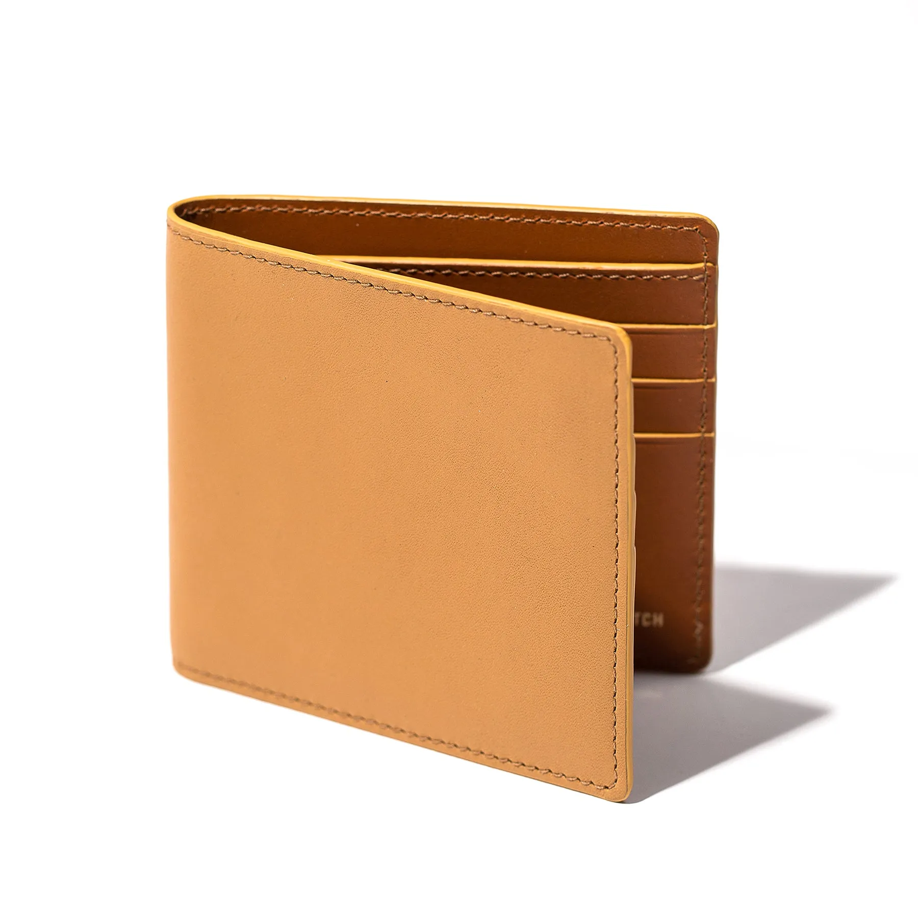 The Minimalist Billfold in Canyon sold by Taylor Stitch