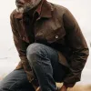 The Long Haul Jacket in Dark Khaki Waxed Canvas sold by Taylor Stitch