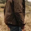 The Long Haul Jacket in Dark Khaki Waxed Canvas sold by Taylor Stitch