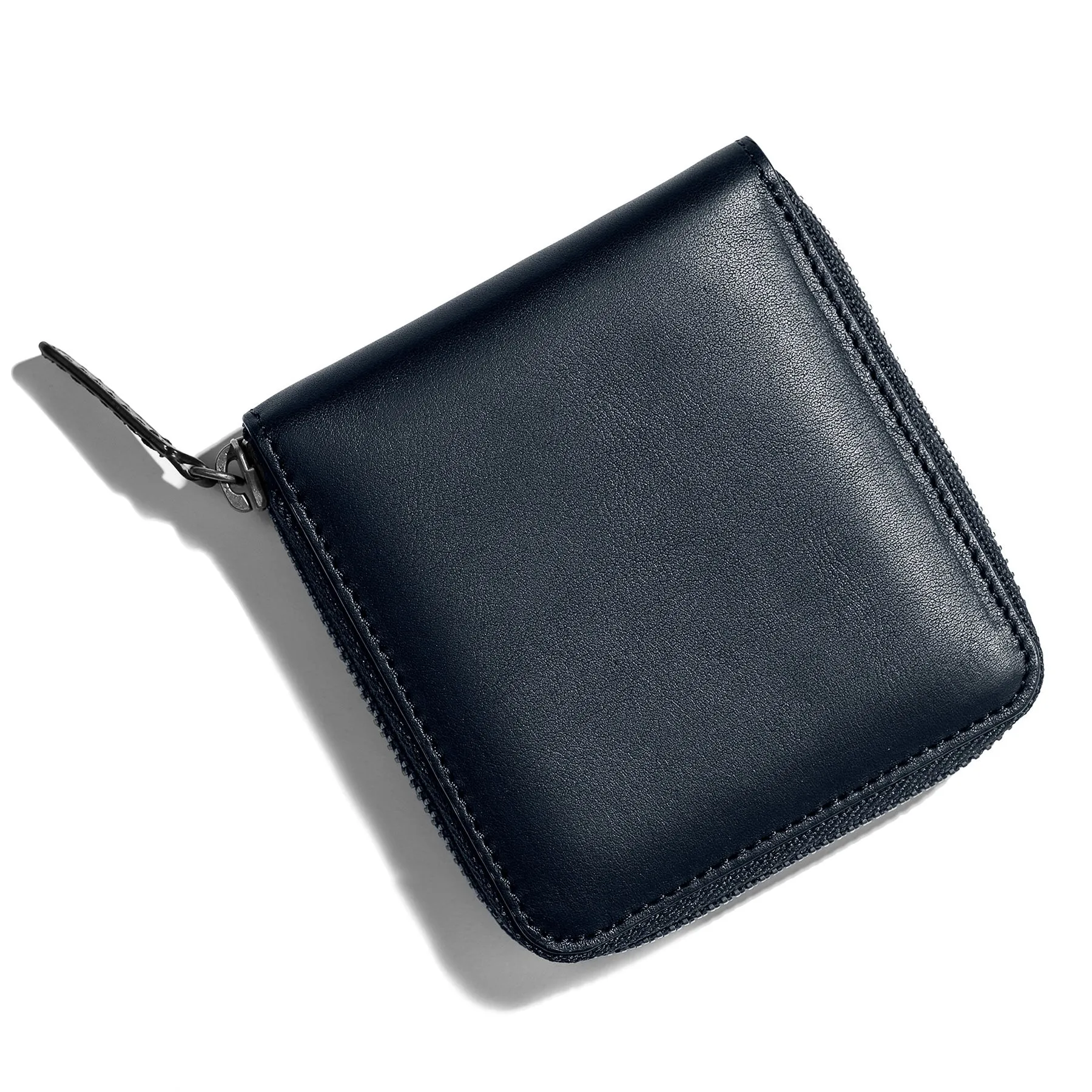 The Zip Wallet in Navy sold by Taylor Stitch