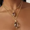18K Medium Astrid Amulet sold by TEMPLE ST CLAIR