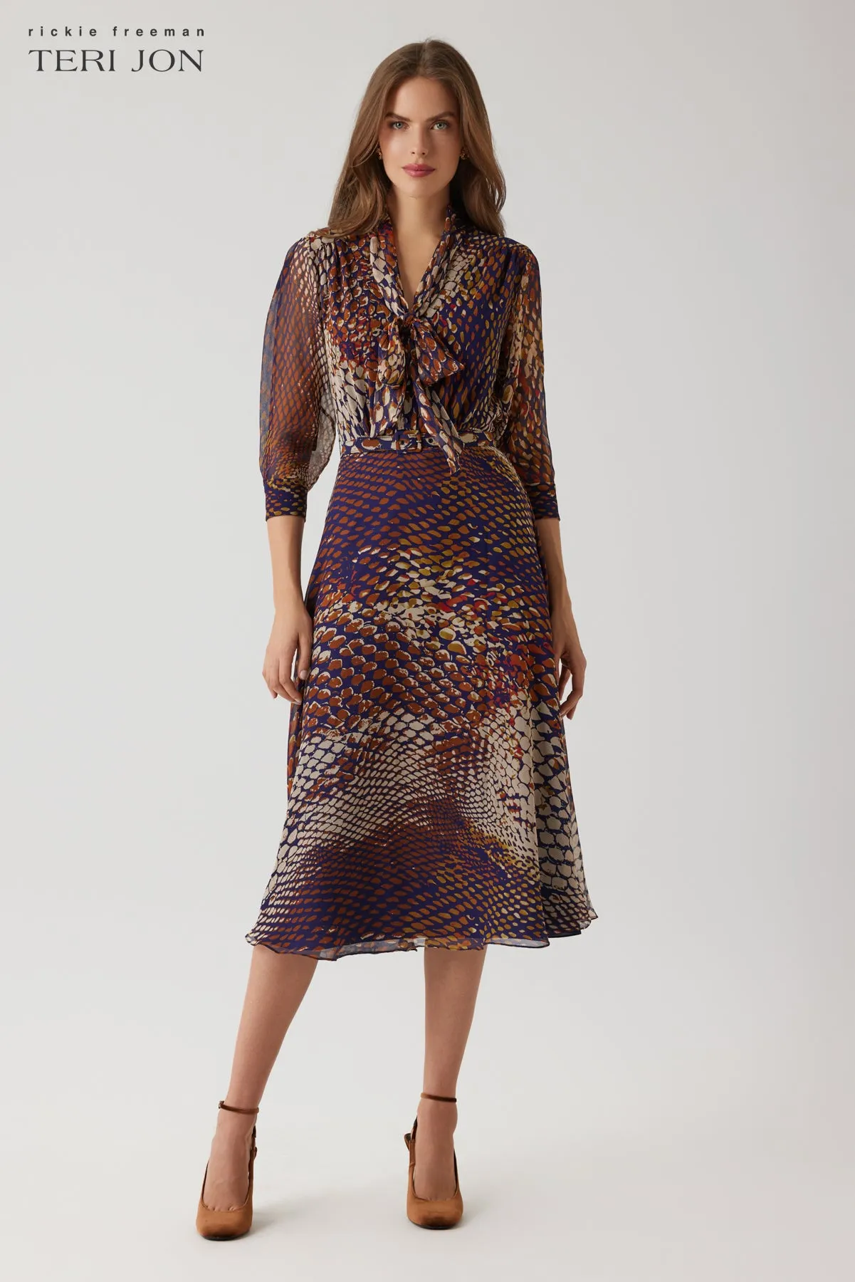 Chiffon Tie Neck Print Fit And Flare Dress sold by Teri Jon