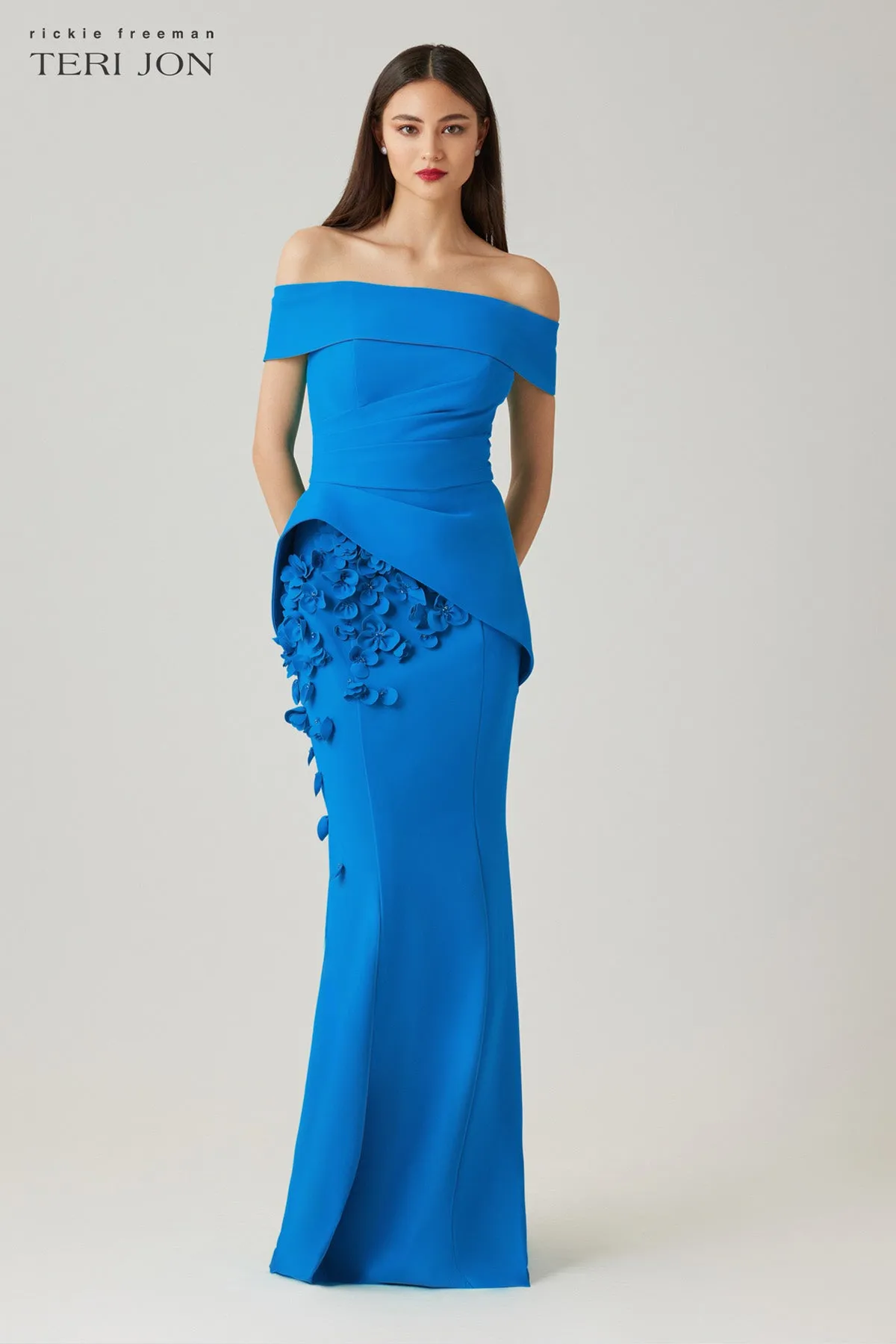 Scuba Off The Shoulder Cuff Peplum Gown with 3D Floral Trim sold by Teri Jon