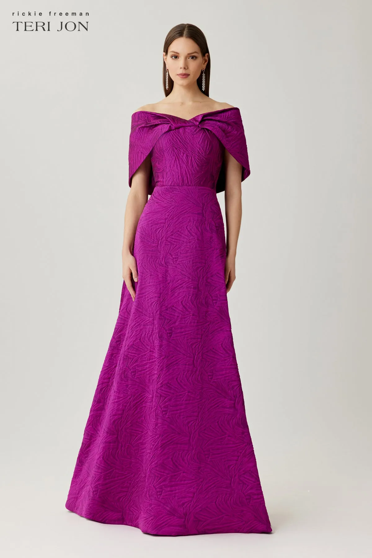 Jacquard Off The Shoulder Gown With Back Bow sold by Teri Jon