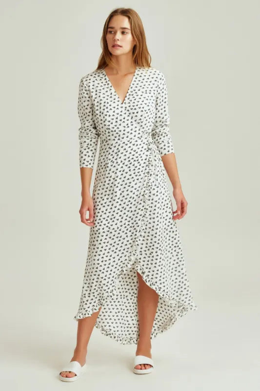 KALEIDOSCOPE WRAP DRESS ivory w black floral sold by The Fifth Label