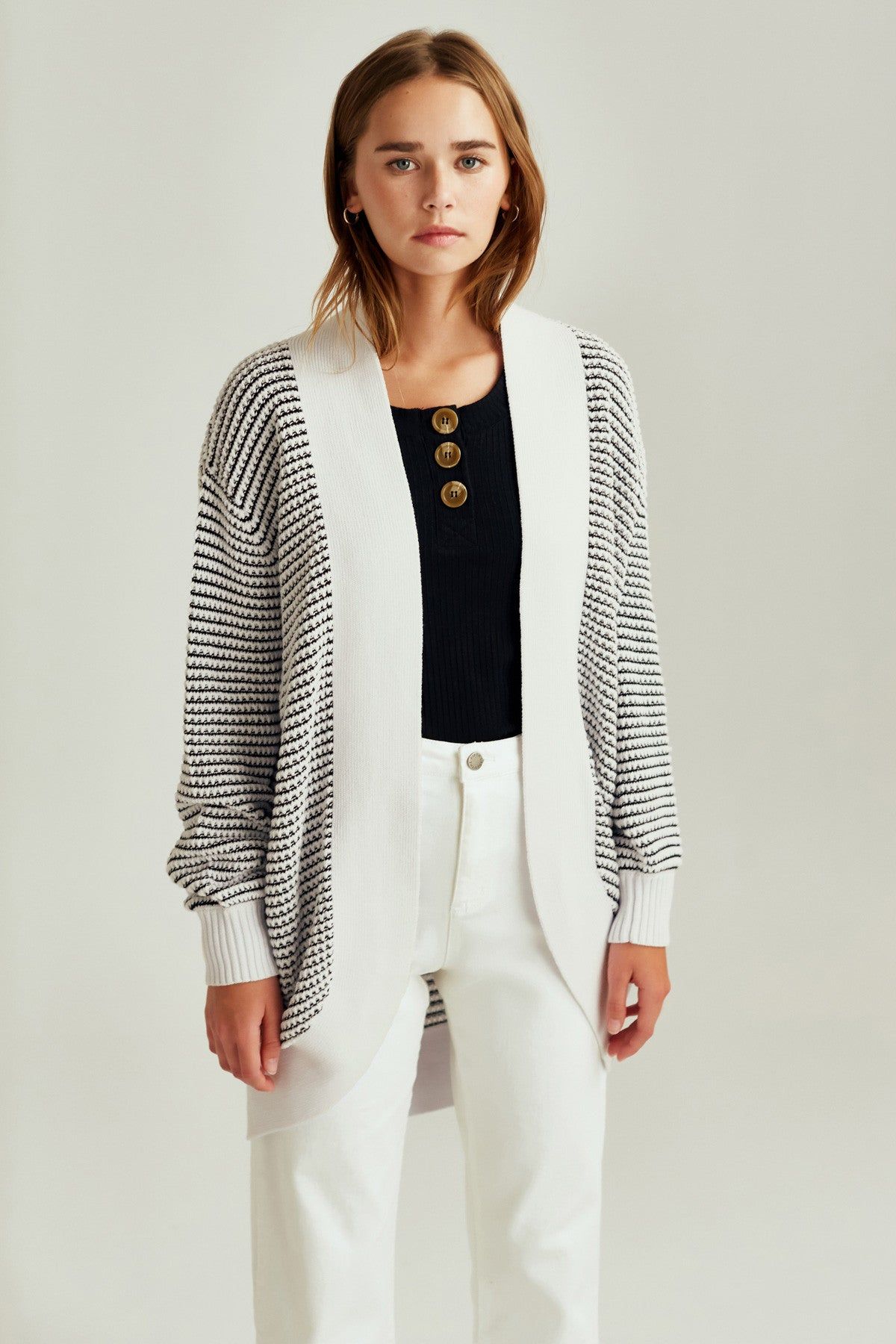 CLIMATIC CARDIGAN black w white sold by The Fifth Label