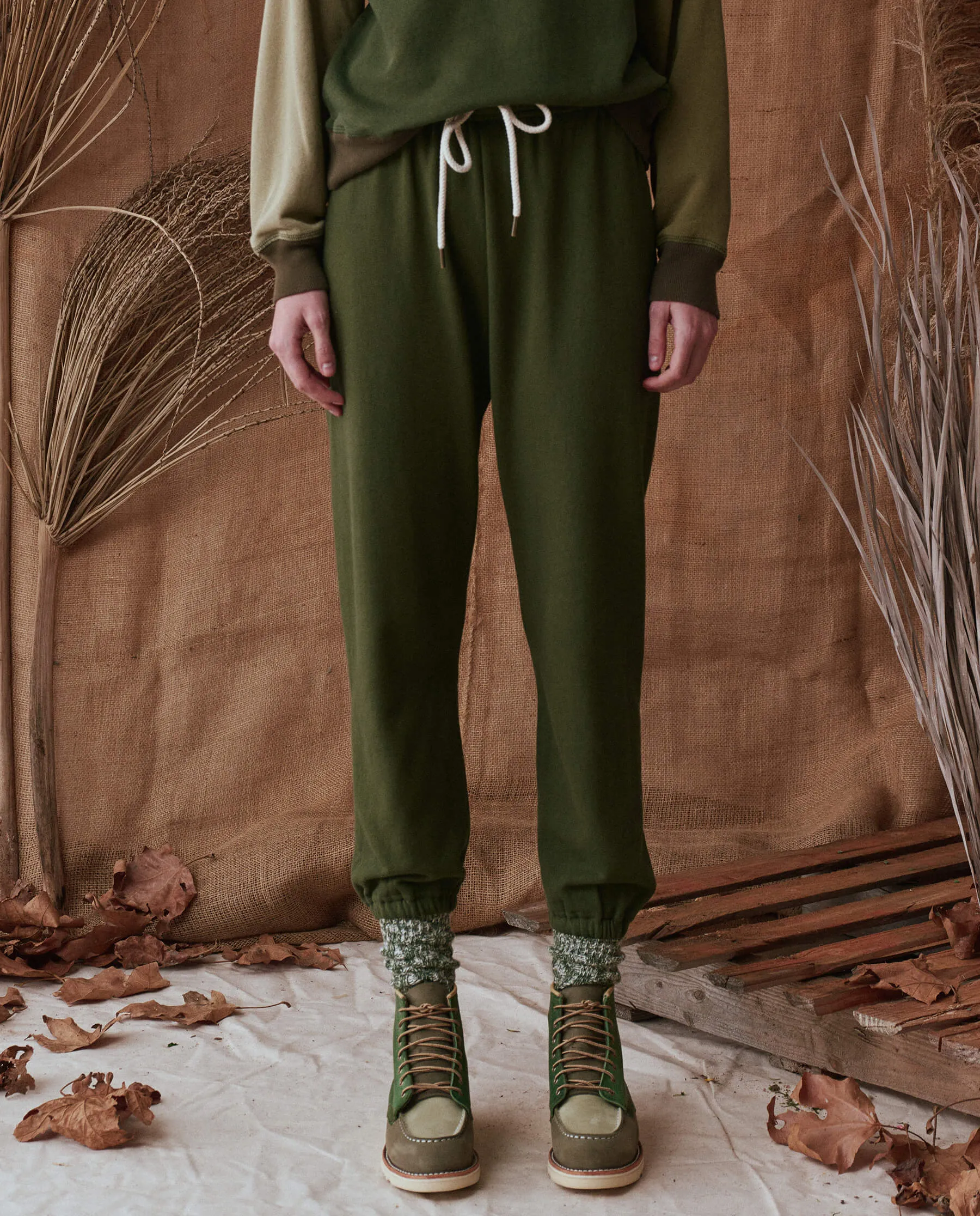 The Stadium Sweatpant. Solid -- Army Green sold by THE GREAT.