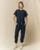 The Crop Tee. Solid -- True Navy sold by THE GREAT.