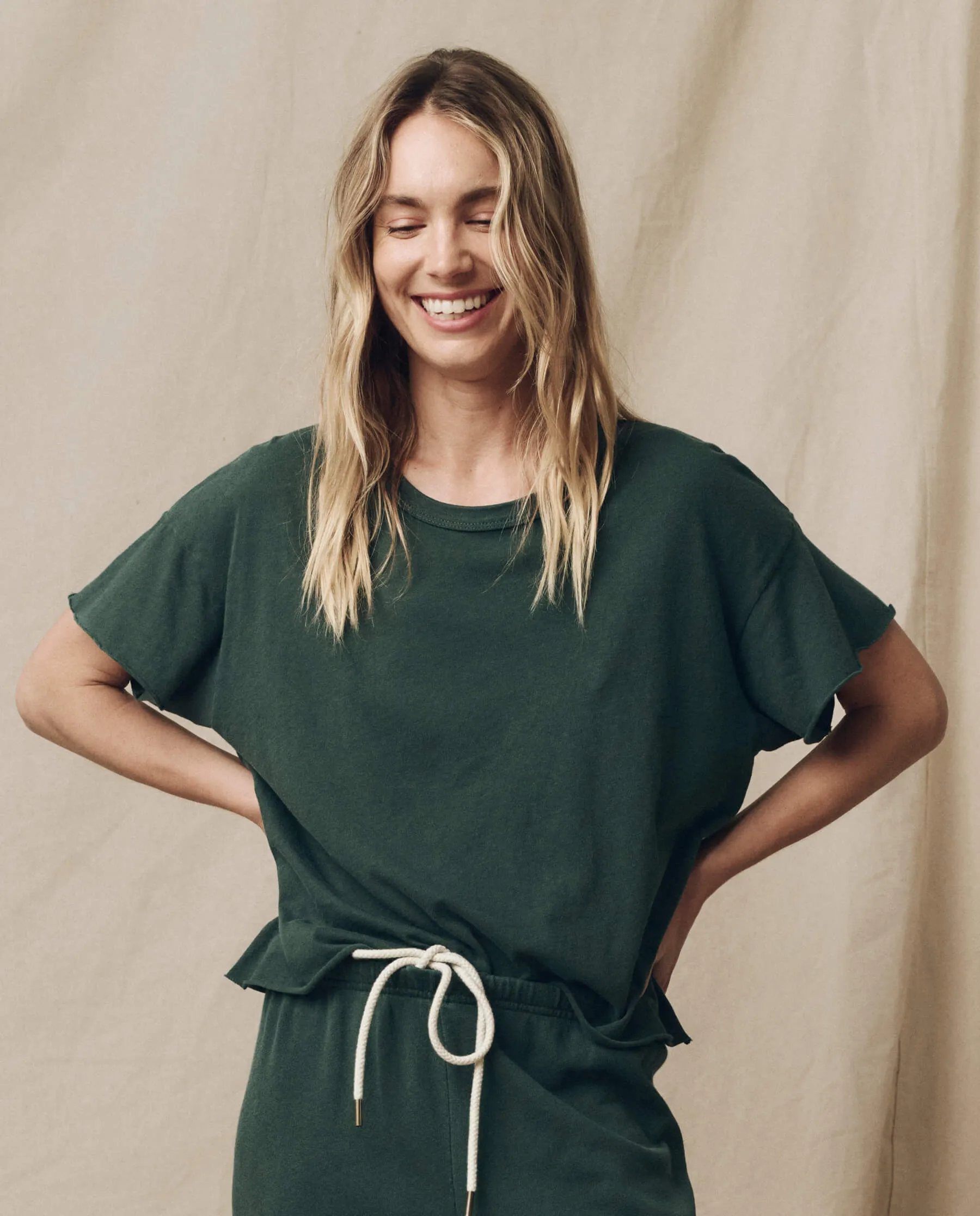 The Crop Tee. Solid -- Deep Sea Green sold by THE GREAT.