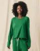 The Long Sleeve Crop Tee. Solid -- Holly Leaf sold by THE GREAT.