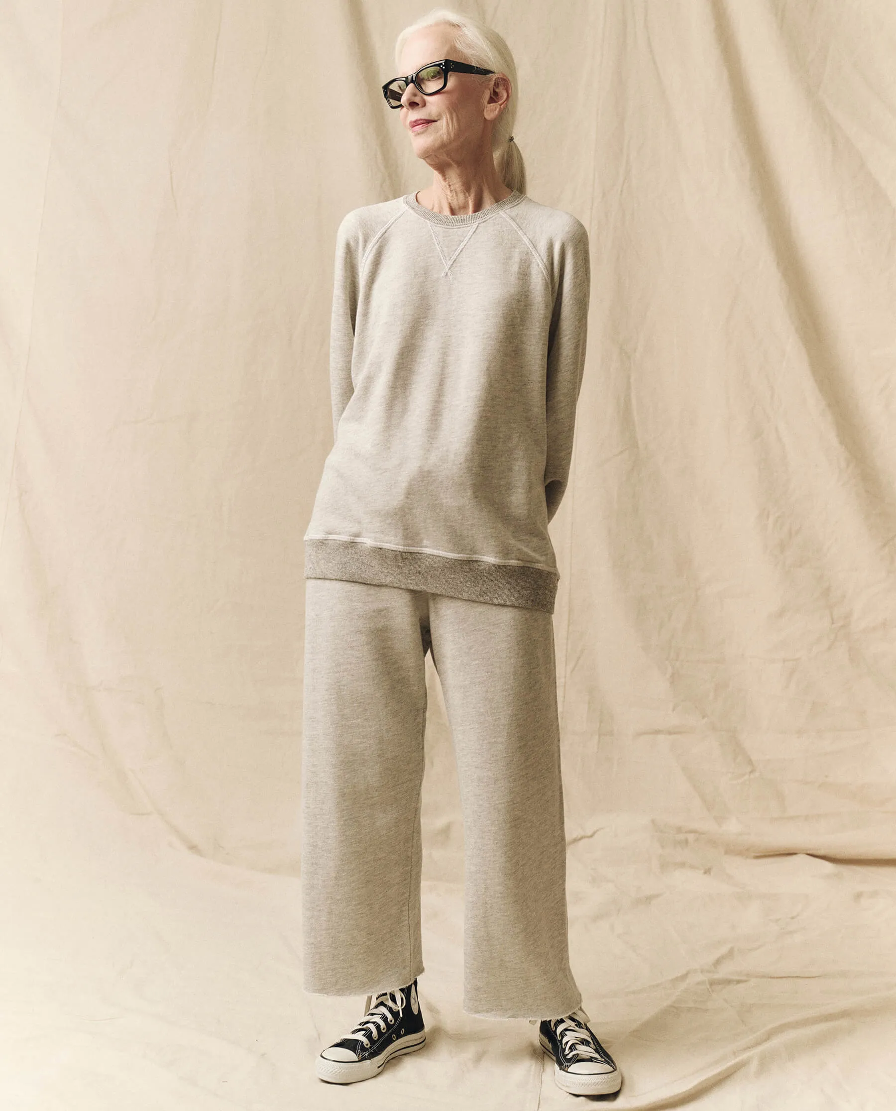 The Wide Leg Cropped Sweatpant. -- Soft Heather Grey sold by THE GREAT.