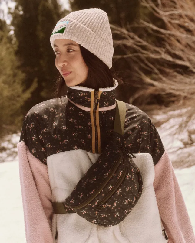 The Down Quilted Puffer Hip Pack. -- Wilderness Floral sold by THE GREAT.