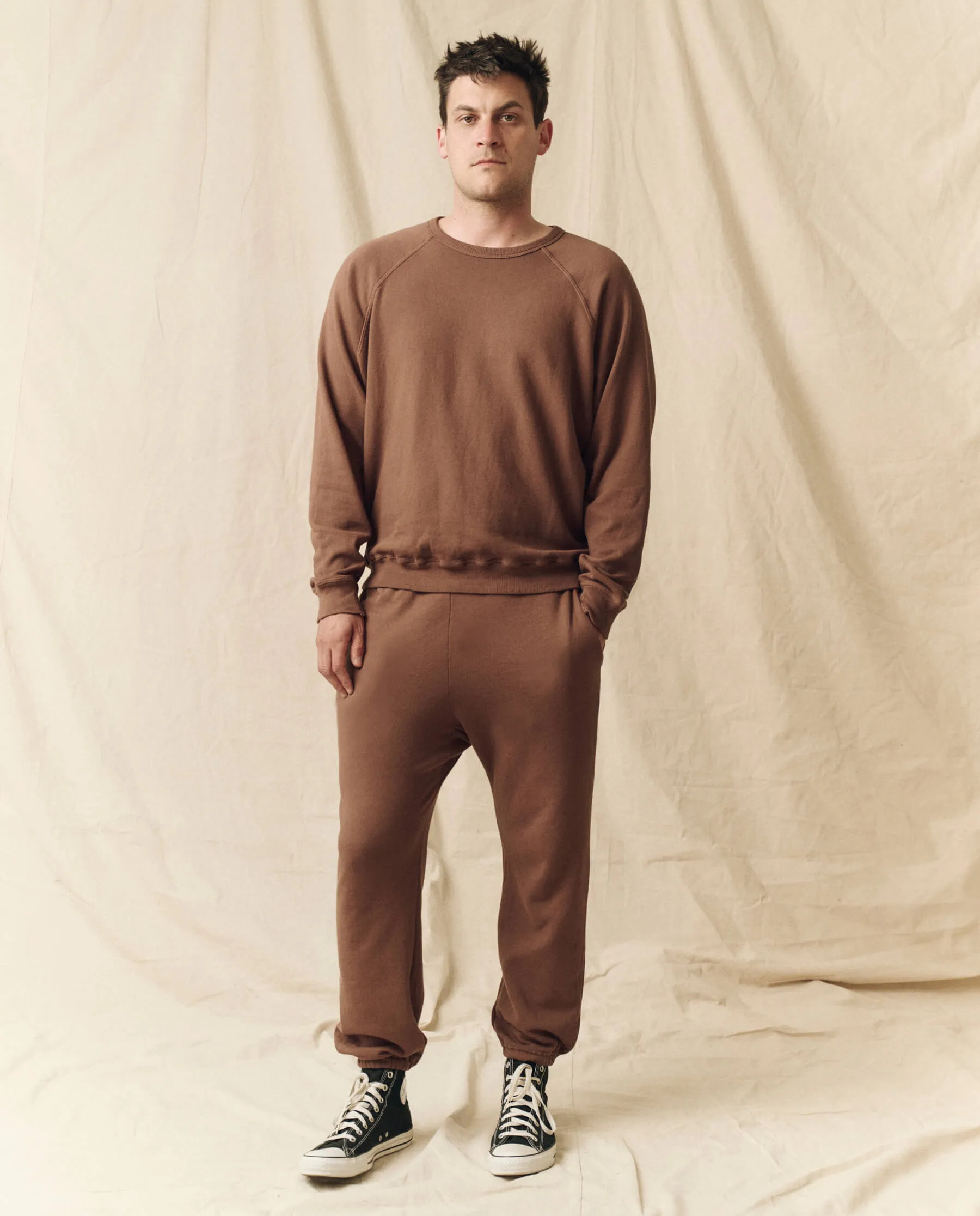 The Men's Stadium Sweatpant. Solid -- Hickory sold by THE GREAT.