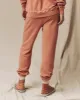 The Stadium Sweatpant. Solid -- Sun Dried Orange sold by THE GREAT.