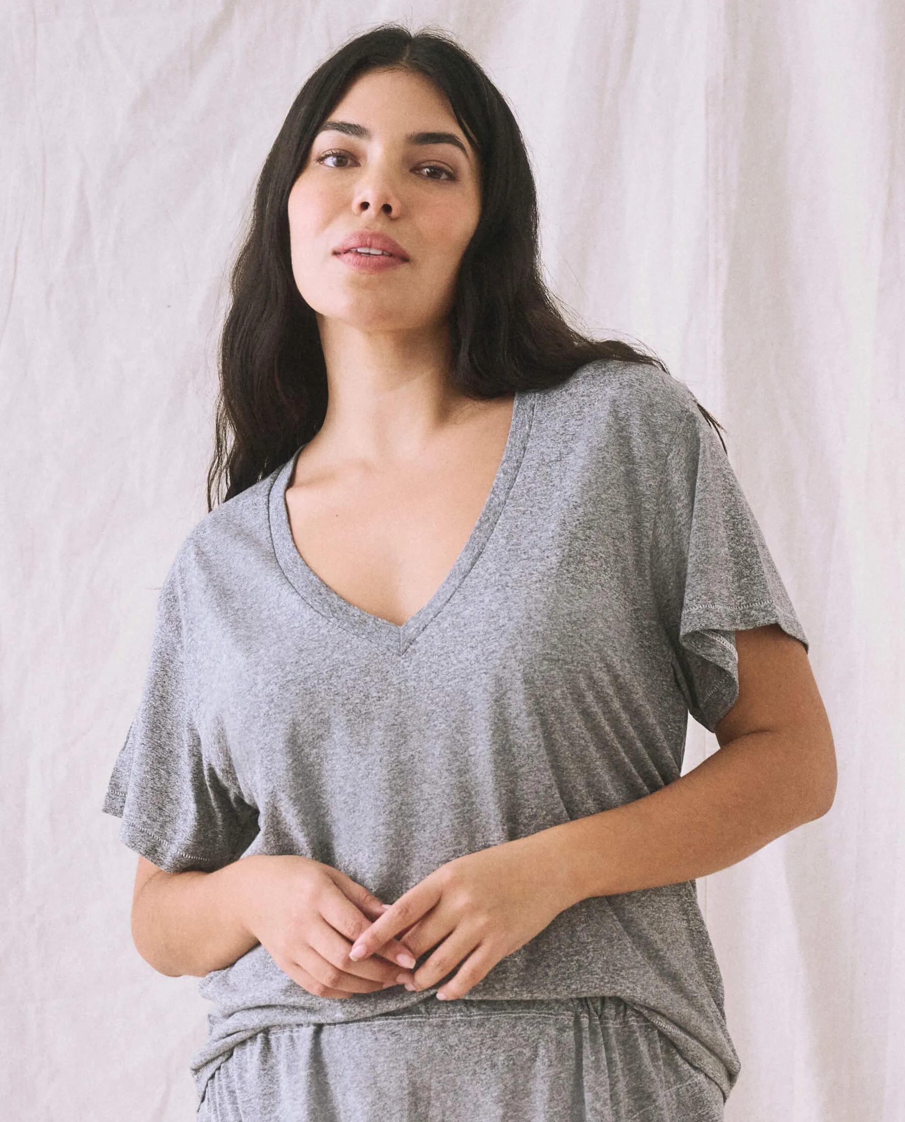 The V-Neck Tee. -- Heather Grey sold by THE GREAT.