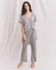 The V-Neck Tee. -- Heather Grey sold by THE GREAT.