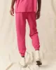 The Cropped Sweatpant. Solid -- Fuchsia sold by THE GREAT.