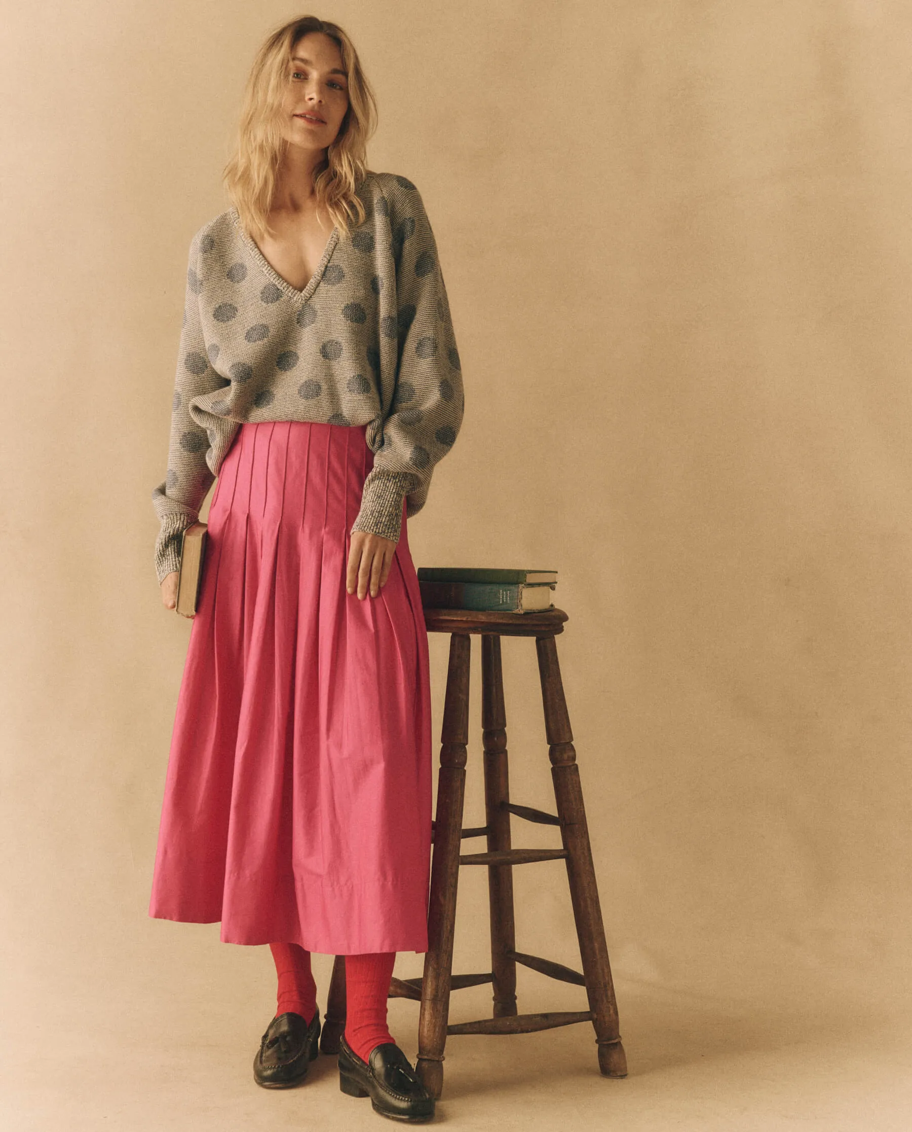 The Rhythm Skirt. -- Fuchsia sold by THE GREAT.