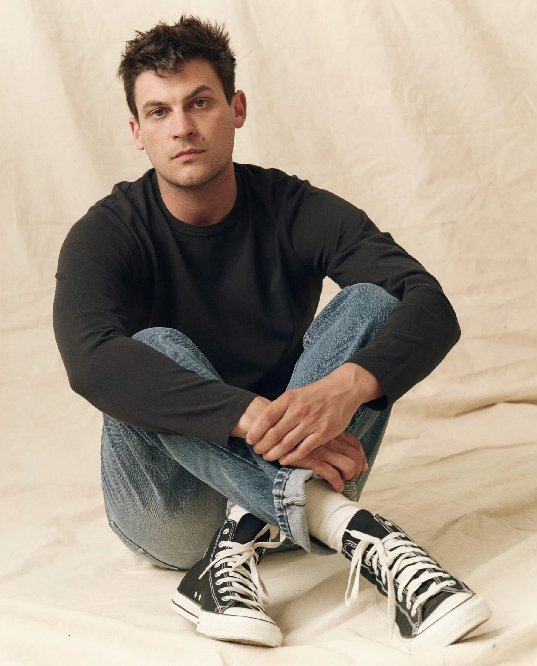 The Men's Pure Knits Long Sleeve Slim Crew. Solid -- Almost Black sold by THE GREAT.