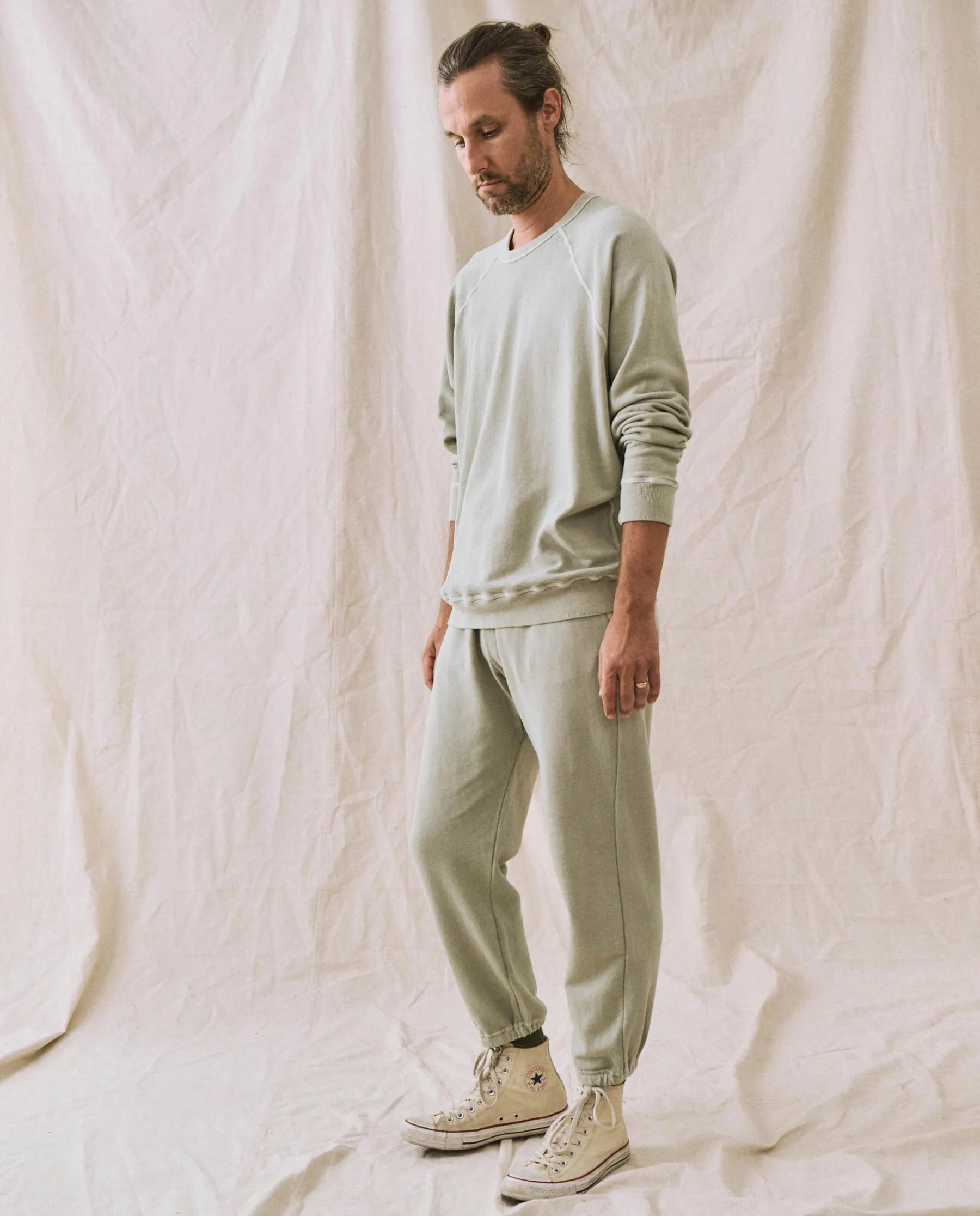 The Men's Stadium Sweatpant. -- Seafoam sold by THE GREAT.