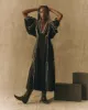 The Dancehall Dress. -- Black with Cream sold by THE GREAT.