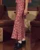 The Seabank Skirt. -- Aubergine Field Bloom Print sold by THE GREAT.