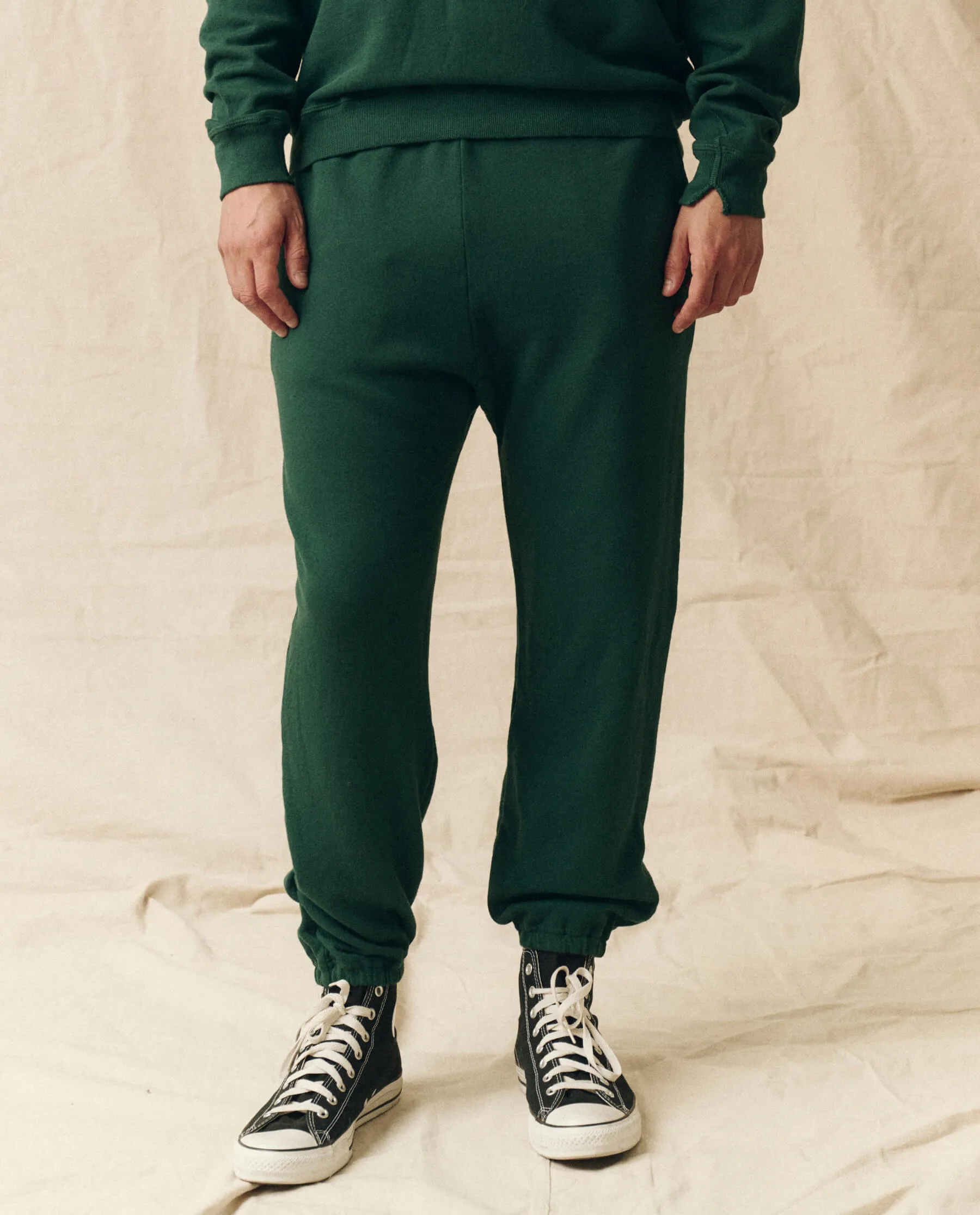The Men's Stadium Sweatpant. -- Green Grove sold by THE GREAT.
