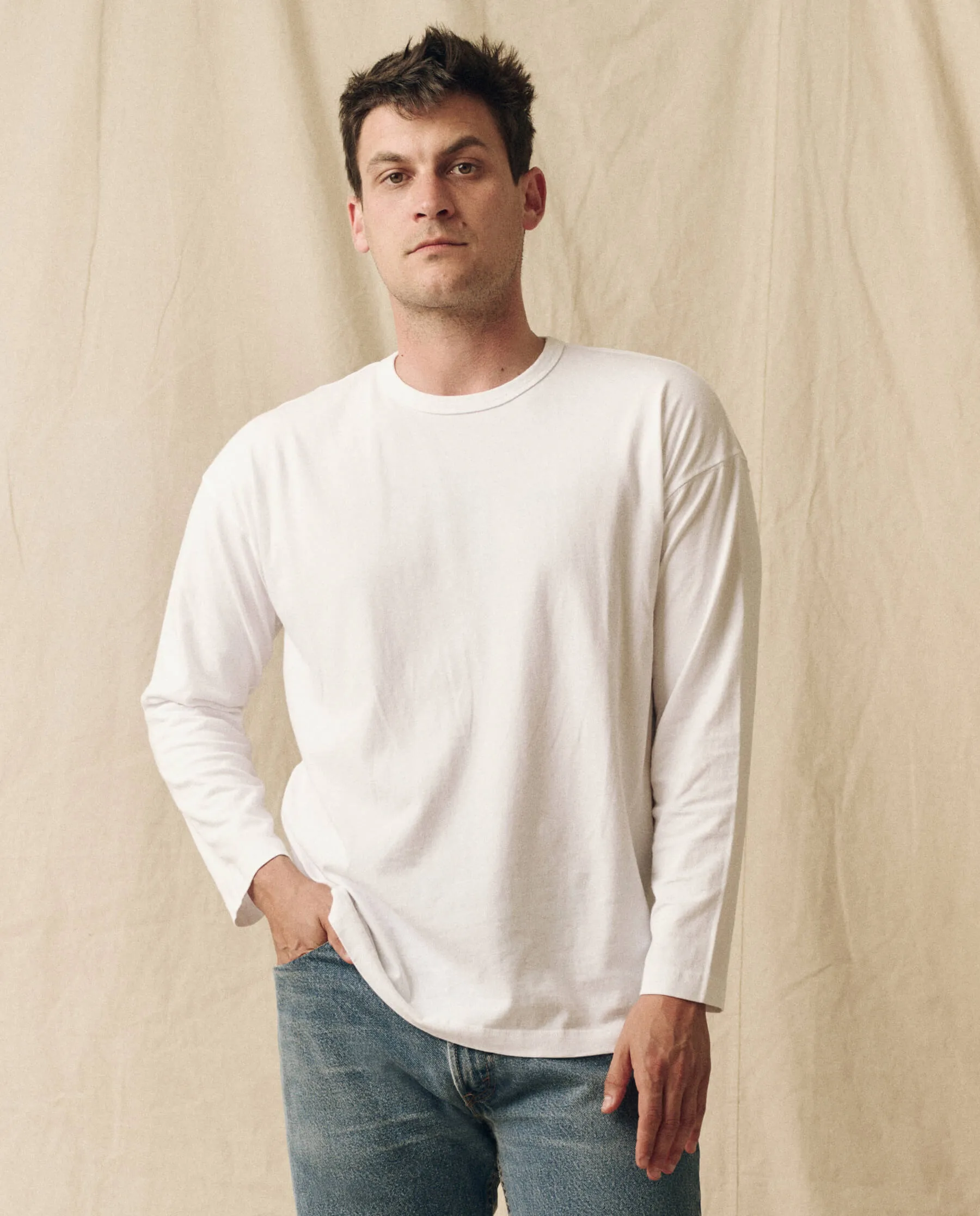 The Men's Pure Knits Long Sleeve Boxy Crew. Solid -- True White sold by THE GREAT.