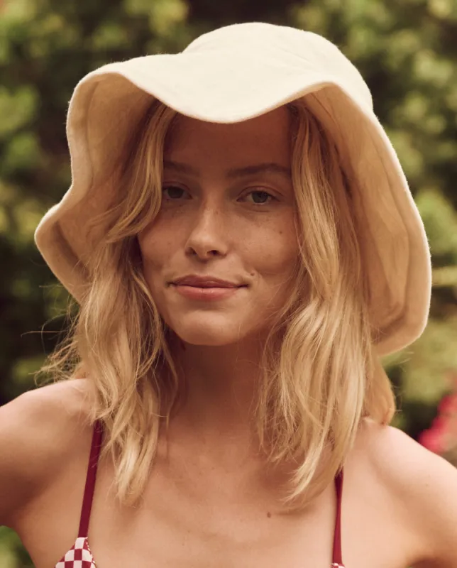 The Sun Hat. -- Cream sold by THE GREAT.