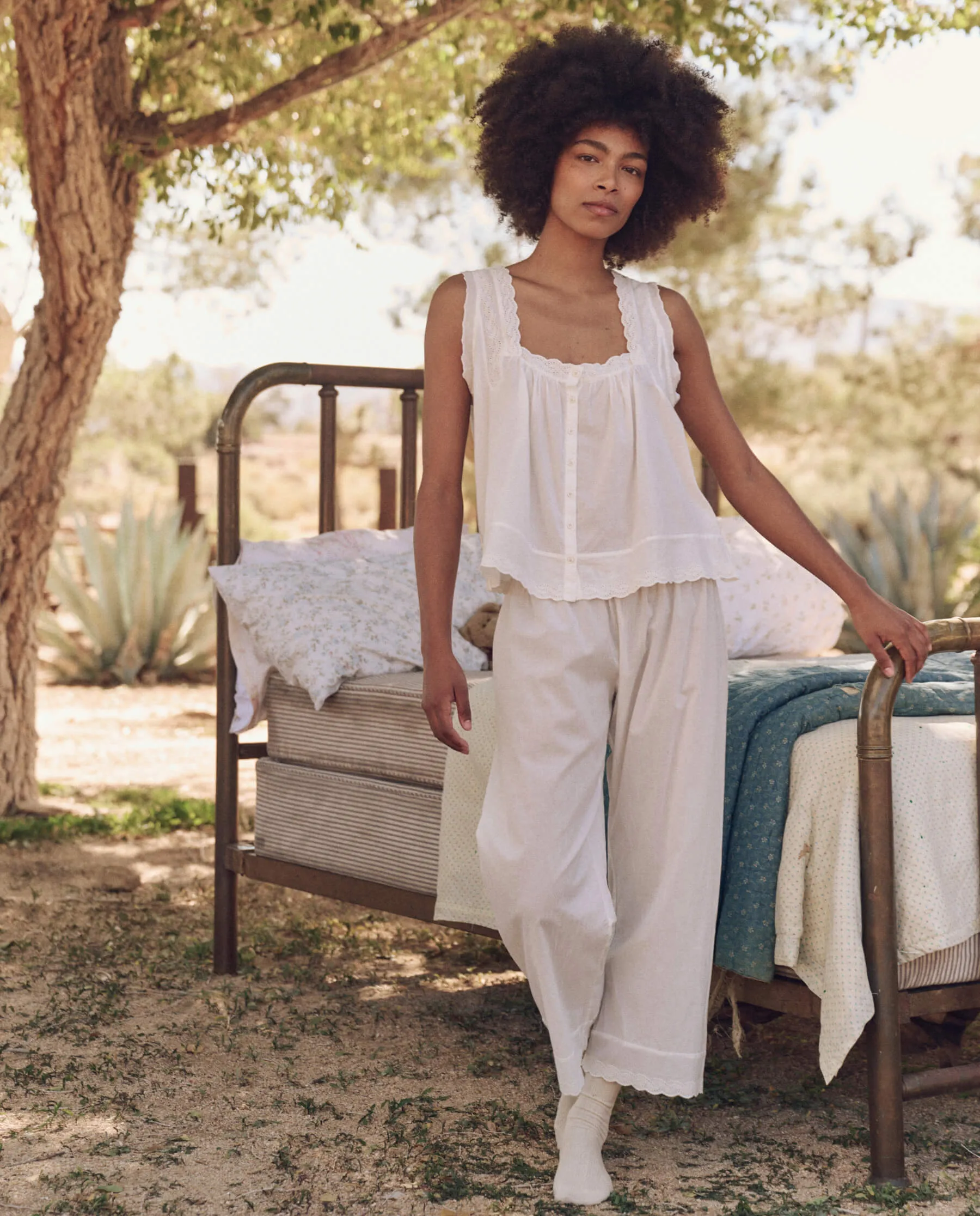 The Eyelet Tank. -- True White sold by THE GREAT.