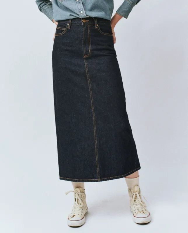 The Column Skirt. -- Midnight Rinse sold by THE GREAT.
