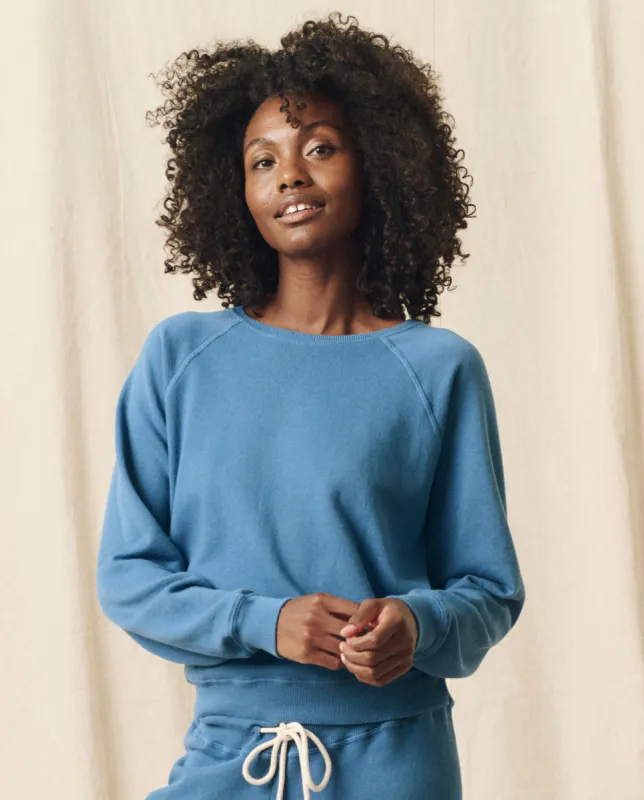 The Shrunken Sweatshirt. Solid -- Glacier Blue sold by THE GREAT.